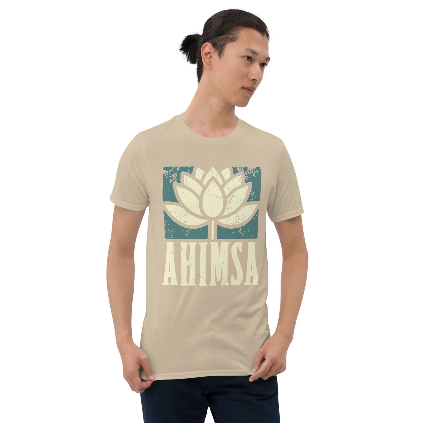 Man wearing Sand short sleeve t-shirt with a distressed lotus flower graphic over the word "AHISMA" in capital letters.