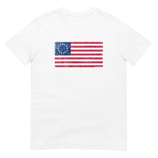 White unisex t-shirt with a distressed  image of a Betsy Ross Flag with 13 stars.
