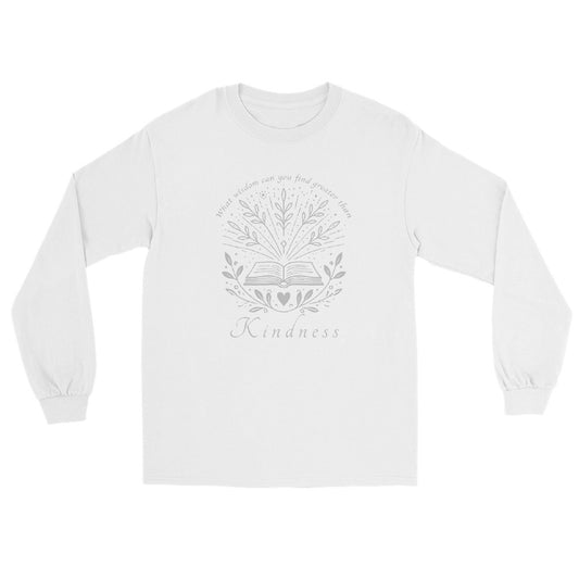 A white long sleeve crewneck t-shirt featuring a silver graphic print of an open book surrounded by leaves and stars, with the text 'What wisdom can you find greater than Kindness' arched above and 'Kindness' written below.