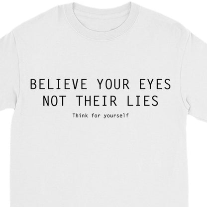 White long sleeve t-shirt with black text 'BELIEVE YOUR EYES NOT THEIR LIES Think for yourself' zoomed