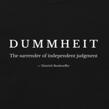 black shirt with minimalist typography reading “Dummheit – The surrender of independent judgment,” inspired by Dietrich Bonhoeffer’s philosophy on independent judgment. zoom design
