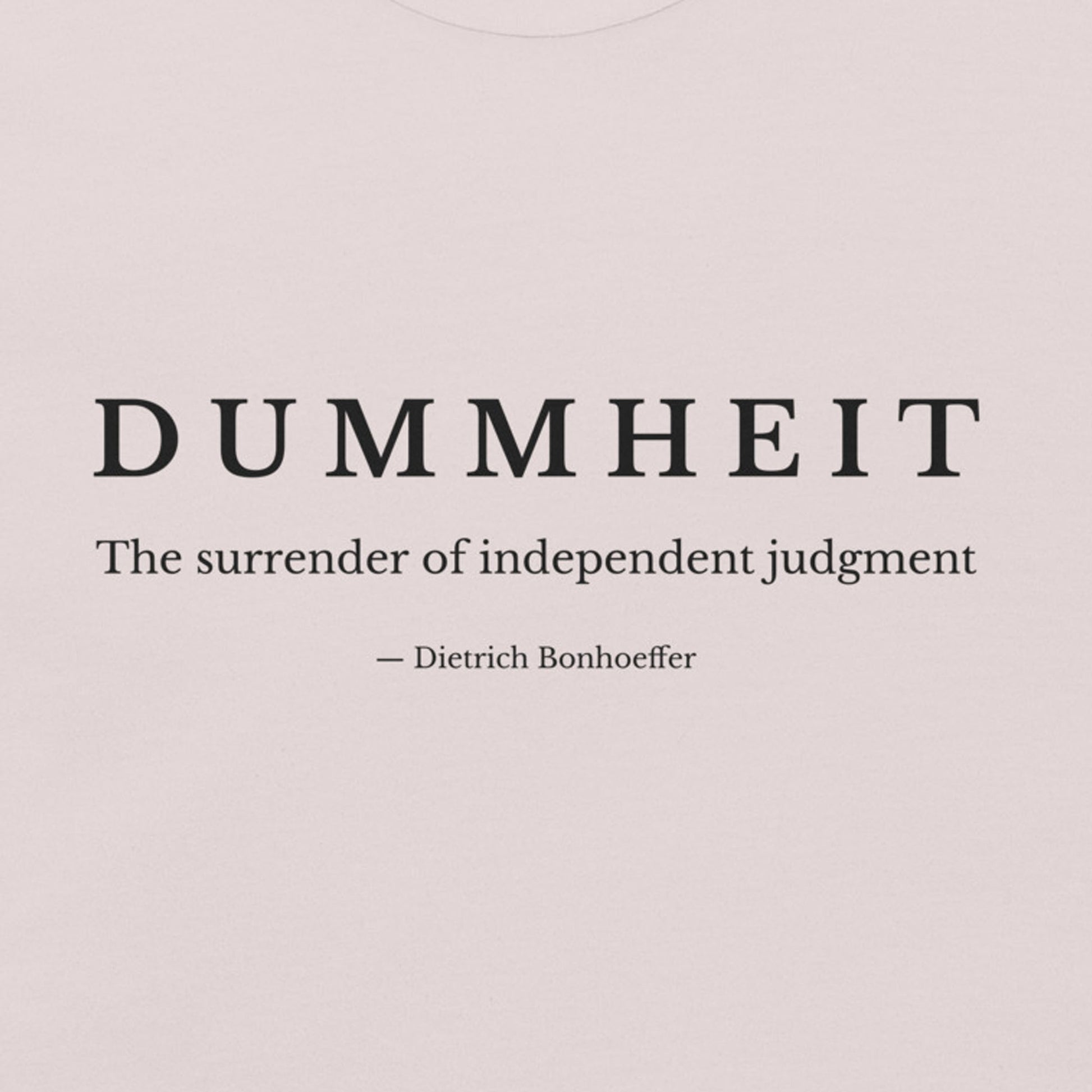 ice grey shirt with minimalist typography reading “Dummheit – The surrender of independent judgment,” inspired by Dietrich Bonhoeffer’s philosophy on independent judgment. zoom design