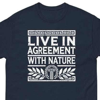 A navy blue crewneck t-shirt featuring a distressed white graphic print that reads 'LIVE IN AGREEMENT WITH NATURE' with classical architectural and laurel leaf motifs.