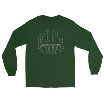 Forest Green long sleeve T-shirt with the words “Hope Endures – In Every Moment” in elegant white typography, inspirational quote design for everyday wear.