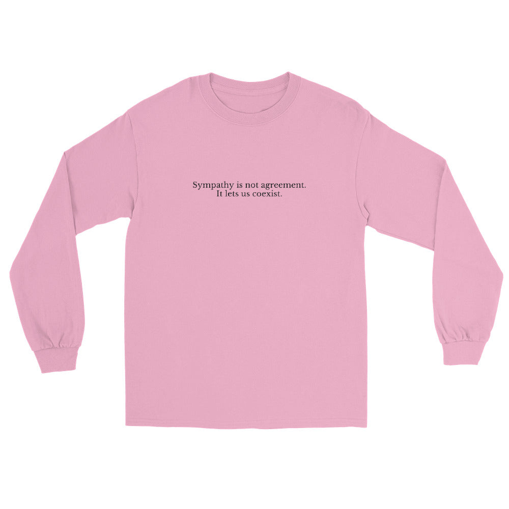 Light Pink long sleeve t-shirt with text in black ink. Top line "Sympathy is not agreement" second line "It lets us coexist".
