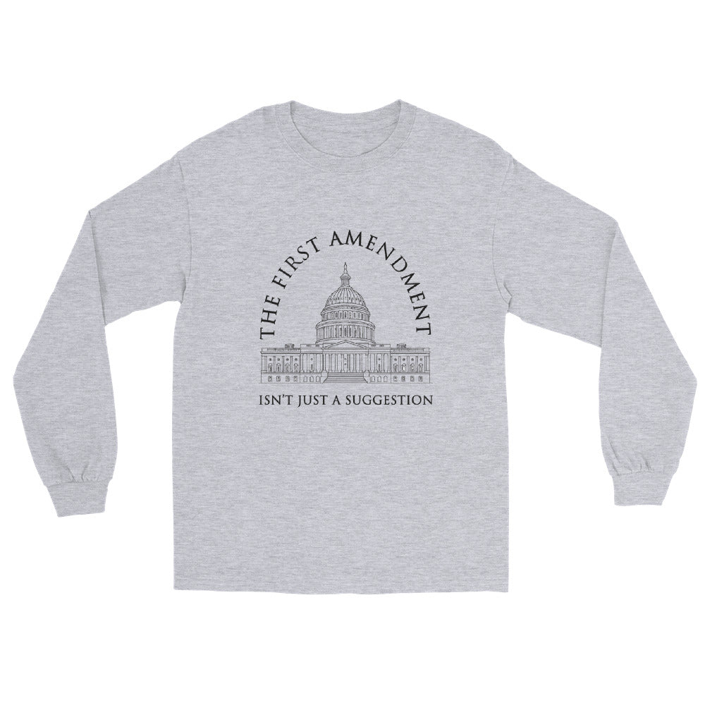 Sport grey long sleeve t-shirt with a line drawing of the US Capital in black ink. Text in an arch over the Capital "The First Amendment" in a line of text under the Capital "Isn't Just A Suggestion"