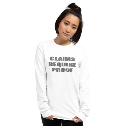 Person wearing white long sleeve t-shirt with distressed bold text "CLAIMS REQUIRE PROOF"