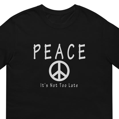 Inspirational peace symbol black T-shirt with the message "Peace. It's Not Too Late." in a clean minimalist design zoomed.