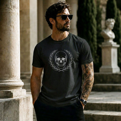 Person wearing a black t-shirt with engraved Roman-style skull with laurel wreath in minimalist stoic philosophy design