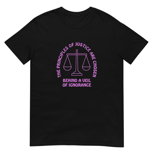 Black t-shirt with pink text in an arch over a line drawing of the scales of justice "The Principles Of Justice Are Chosen" and horizontally cross the bottom of the design "Behind A Veil Of Ignorance"