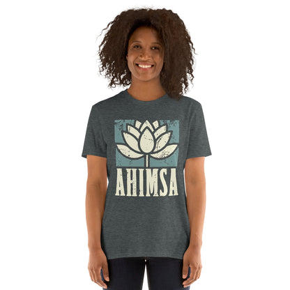Person wearing a dark heather t-shirt with a distress image of a lotus flower and the text "AHIMSA"