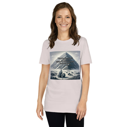 Woman wearing ice grey t-shirt with graphic of mountain and Asian man the words “The man who moves a mountain begins by carrying away small stones.”