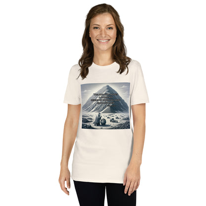 Woman wearing natural color t-shirt with graphic of mountain and Asian man the words “The man who moves a mountain begins by carrying away small stones.”