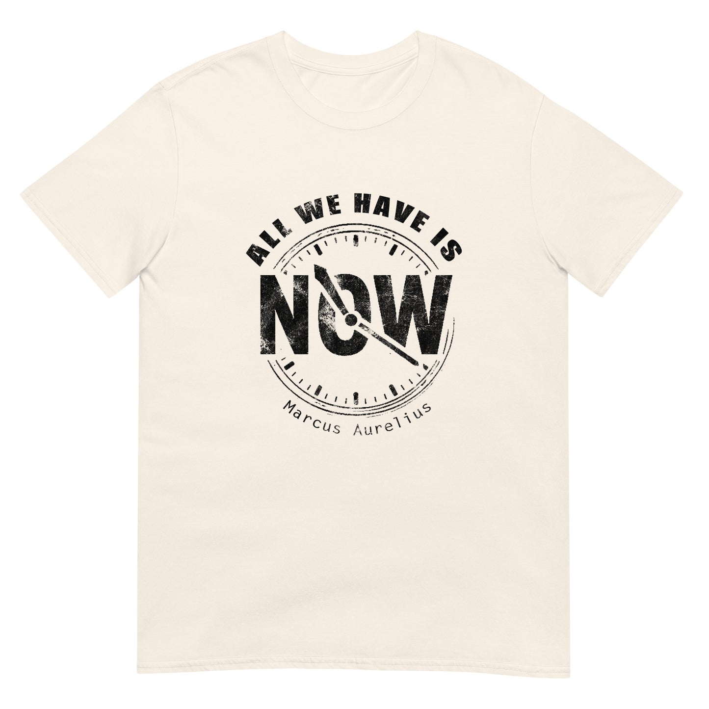 Natural unisex t-shirt with white line drawing of a clock showing “NOW” at the center and the quote “All We Have Is” above it in an arch and "Marcus Aurelius" in small font underneath the clock.