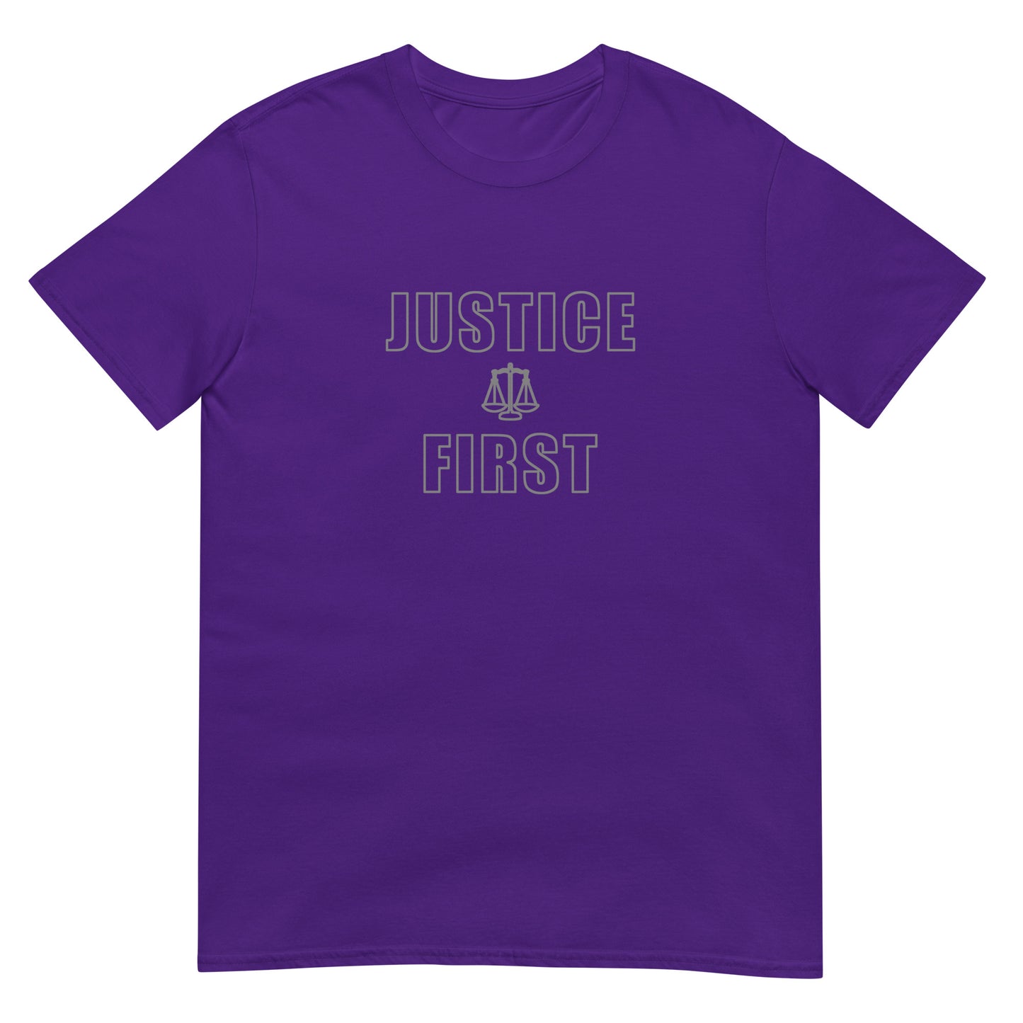 Purple t-shirt with text outlined block letters "Justice First" with a line drawing of the scales of justice between the words in silver ink.