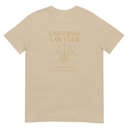 Sand unisex t-shirt featuring a gold  'Universal Law Club' design with scales of justice over a globe and the slogan 'Founded 1785 — No Exceptions Since' inspired by Immanuel Kant’s Categorical Imperative.