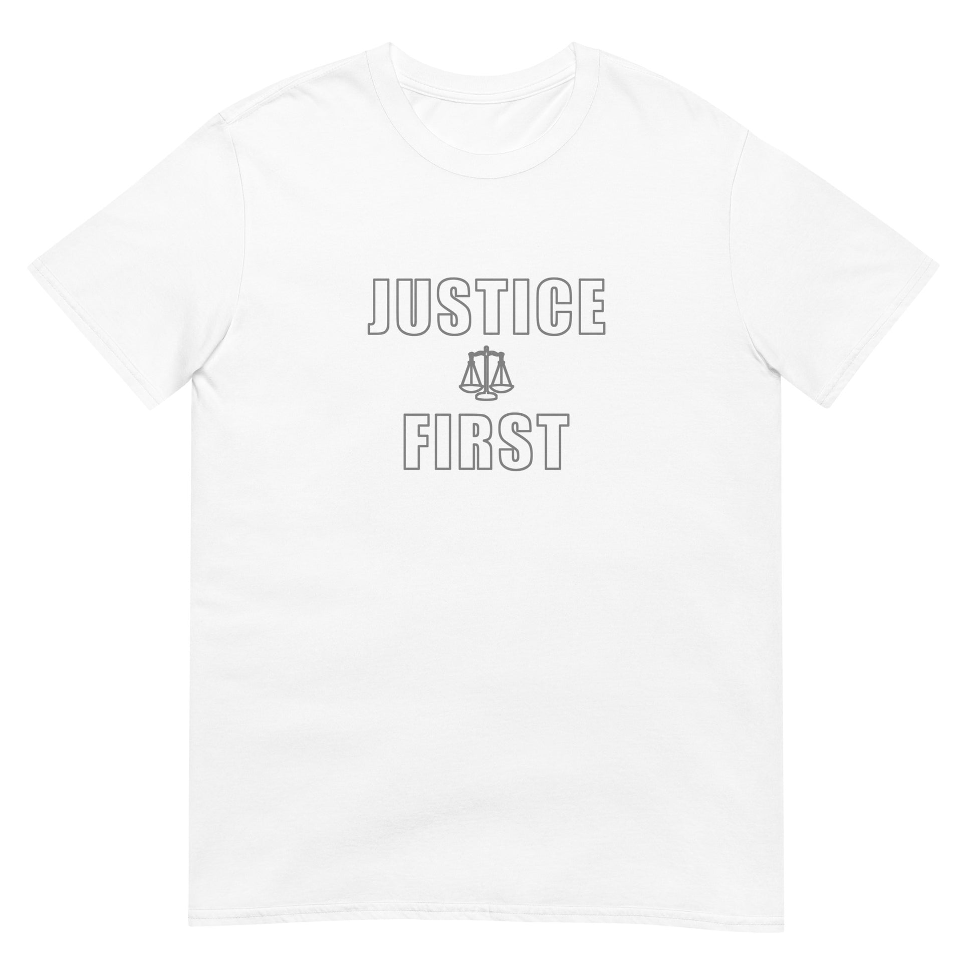White t-shirt with text outlined block letters "Justice First" with a line drawing of the scales of justice between the words in silver ink.