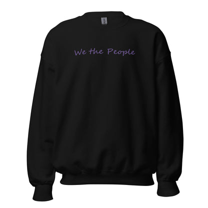 Black unisex crew neck sweatshirt with the words "We the People" in a script font using purple ink.