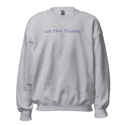 Sport grey unisex crew neck sweatshirt with the words "We the People" in a script font using purple ink.