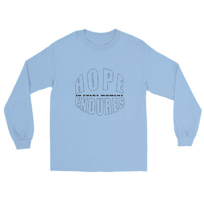 Light blue long sleeve T-shirt with the words “Hope Endures – In Every Moment” in elegant white typography, inspirational quote design for everyday wear.