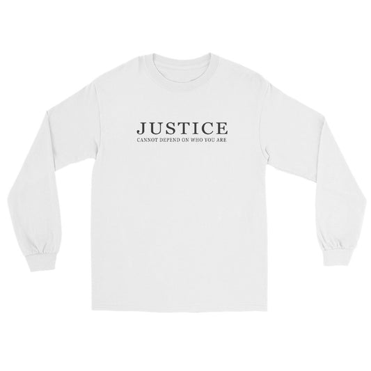 A white long sleeve crewneck t-shirt with the text 'JUSTICE CANNOT DEPEND ON WHO YOU ARE' printed in silver across the chest.