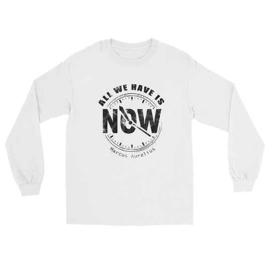 White long sleeve t-shirt with black line drawing of a clock showing “NOW” at the center and the quote “All We Have Is” above it in an arch and "Marcus Aurelius" in small font underneath the clock.