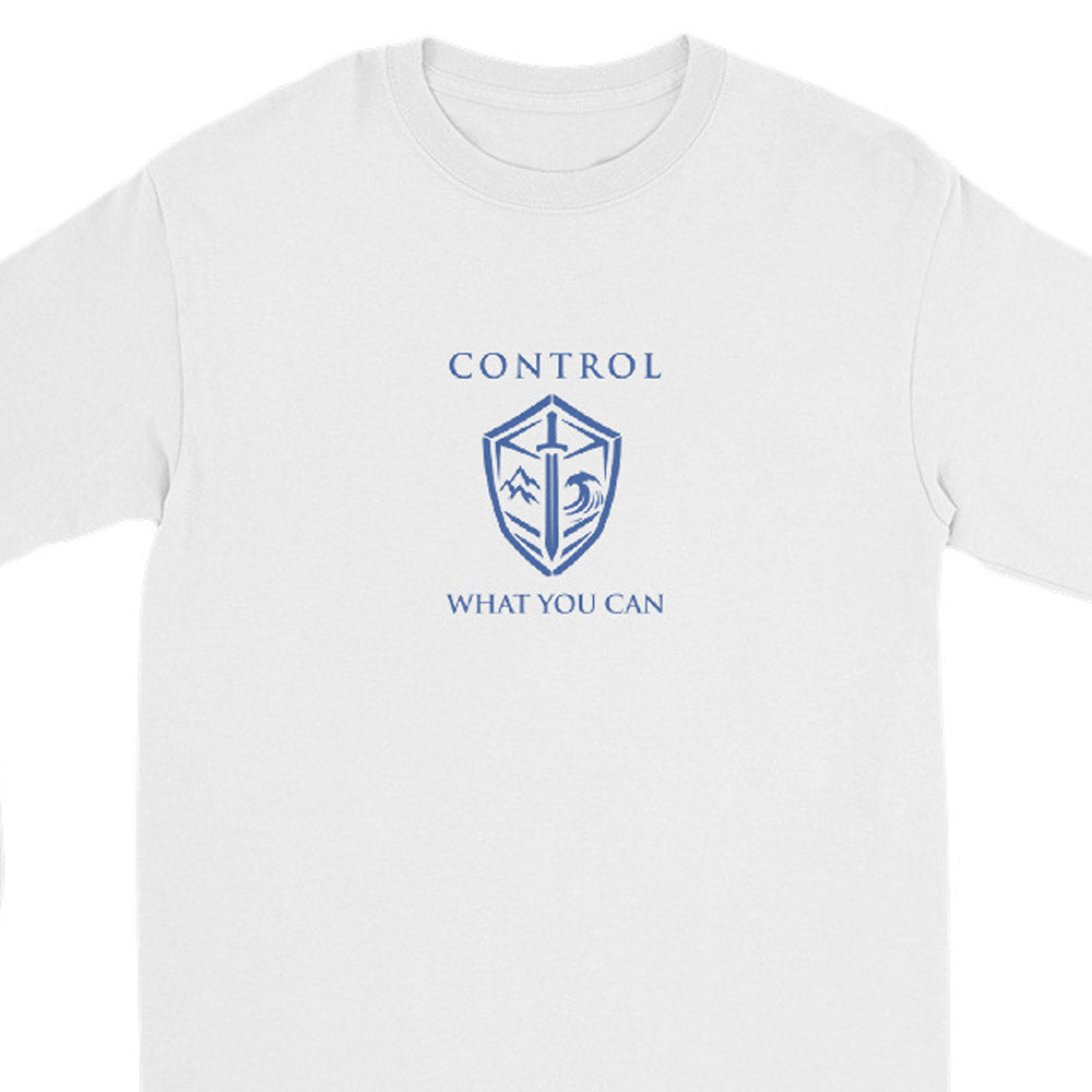 A white long-sleeve crewneck t-shirt featuring a gold graphic print on the chest with the text 'CONTROL WHAT YOU CAN' and a shield emblem.